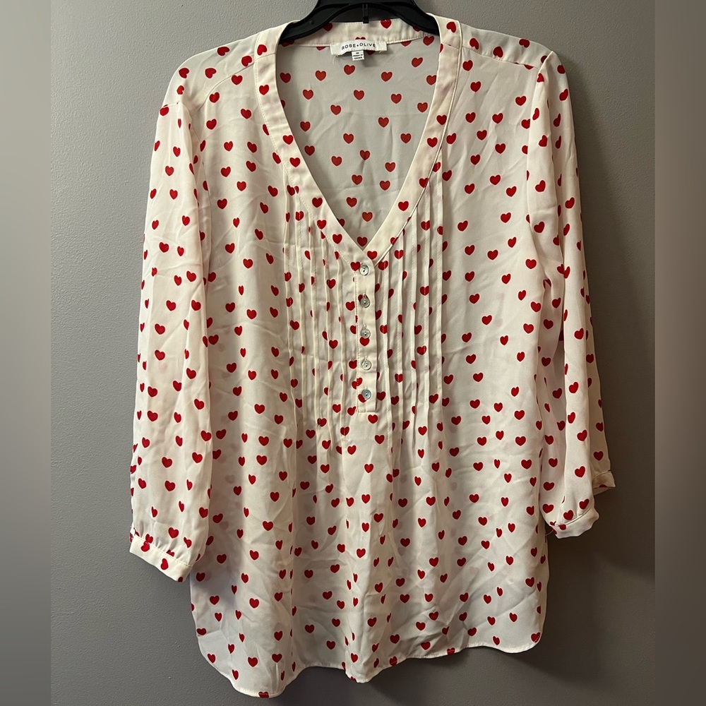 White blouse with pink hearts